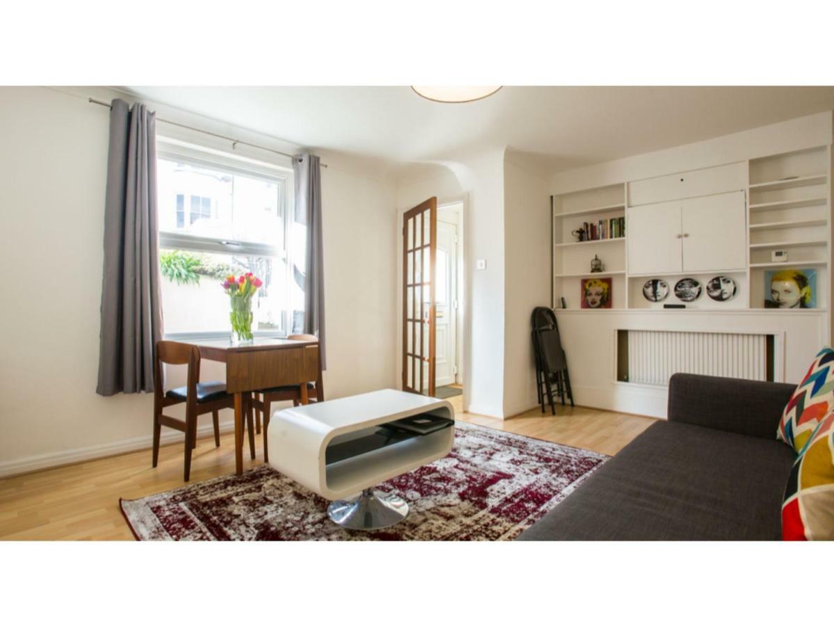 Elegant 1BDR w/private garden in vibrant Brighton Appartement Buitenkant foto